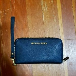 Michael Kors black and gold clutch